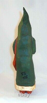 1988 Hand Carved Painted Wood Folk Art Santa Clause or Belsnickel By J Bastian