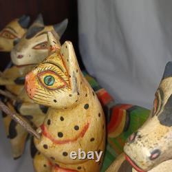 4 Folk Art Wooden Cows & 1 Cat On A Bench Fishing Carved & Painted