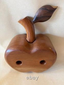 Amazing folk art wooden sculpture, two faces on drawers that open from an apple