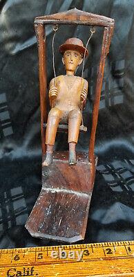 Antique Carved Wood Folk Art MAN ON A SWING Primitive One Of A Kind