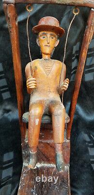 Antique Carved Wood Folk Art MAN ON A SWING Primitive One Of A Kind