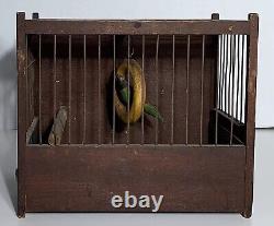 Antique FOLK ART CARVED & PAINTED WOOD BIRD ON SWING IN CAGE