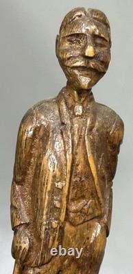 Antique Primitive Folk Art Carving of a Man In Suit With Cane