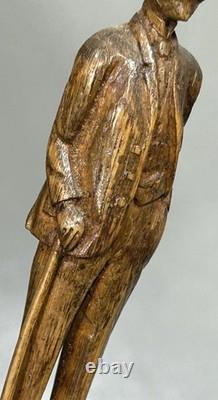 Antique Primitive Folk Art Carving of a Man In Suit With Cane