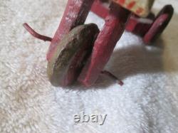 Antique Primitive Folk Art Hand Carved Wood Toy Monkey Riding Tricycle