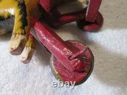 Antique Primitive Folk Art Hand Carved Wood Toy Monkey Riding Tricycle