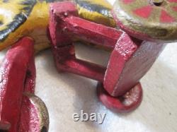 Antique Primitive Folk Art Hand Carved Wood Toy Monkey Riding Tricycle