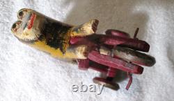 Antique Primitive Folk Art Hand Carved Wood Toy Monkey Riding Tricycle