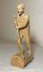 Antique Hand Carved Wood Folk Art Lumberjack Man Cutting Wood Sculpture Statue