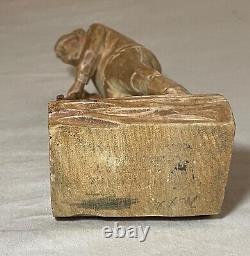 Antique hand carved wood Folk Art lumberjack man cutting wood sculpture statue