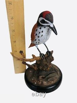 Bird on Perch Hand Carved Painted Wood Folk Art Glass Eyes Red Feathers