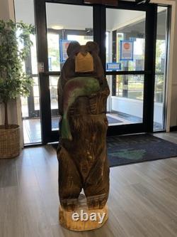 Chainsaw Carved Bear Holding A Fish, 48 Inches Tall, 13 Inches. Hand Painted