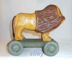 Contemporary Hand Carved Painted Wood Primitive Folk Art Lion Pull Toy on Wheels