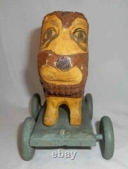 Contemporary Hand Carved Painted Wood Primitive Folk Art Lion Pull Toy on Wheels