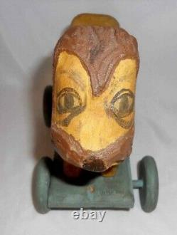 Contemporary Hand Carved Painted Wood Primitive Folk Art Lion Pull Toy on Wheels