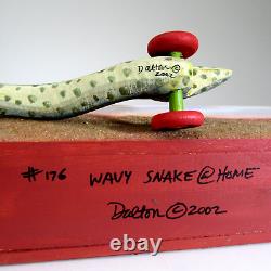 DONA DALTON folk art carved wood WAVY SNAKE @ HOME wooden sculpture toy wheels
