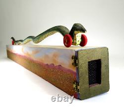 DONA DALTON folk art carved wood WAVY SNAKE @ HOME wooden sculpture toy wheels