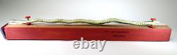 DONA DALTON folk art carved wood WAVY SNAKE @ HOME wooden sculpture toy wheels