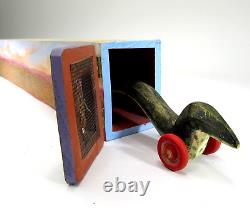 DONA DALTON folk art carved wood WAVY SNAKE @ HOME wooden sculpture toy wheels