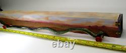 DONA DALTON folk art carved wood WAVY SNAKE @ HOME wooden sculpture toy wheels
