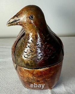 Delightful hand carved folk art snuff box carved bird with nail head eyes
