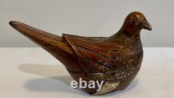 Delightful hand carved folk art snuff box carved bird with nail head eyes