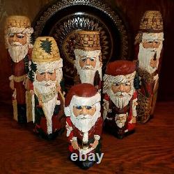 Folk Art CARVED SANTAS SET OF SIX BY ARTIST DONIS MITCHELL SIGNE DATED 90'S