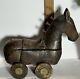 Folk Art Carved Wooden Horse On Wheels Storage Compartment