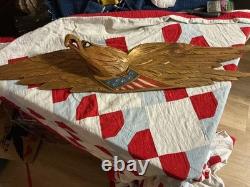 Folk Art carved eagle with flag and carved stars