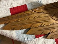 Folk Art carved eagle with flag and carved stars