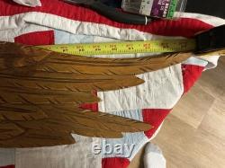 Folk Art carved eagle with flag and carved stars
