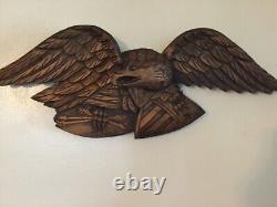 Folk Art carved eagle with shield and arrows