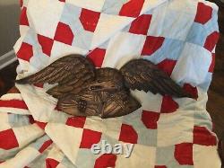 Folk Art carved eagle with shield and arrows