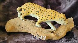 Folk art wood carving of Spotted wild cat by Ted Smith of Swannanoa, NC, 1993