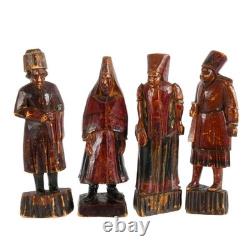 Group of Four Russian Folk-Art Hand-Carved Painted Wood