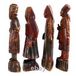 Group of Four Russian Folk-Art Hand-Carved Painted Wood