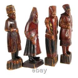 Group of Four Russian Folk-Art Hand-Carved Painted Wood