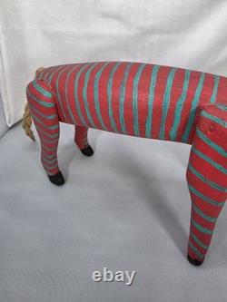 Intricately Patterned Carved Wooden Dog Is A Type of Mexican Folk Art Sculpture