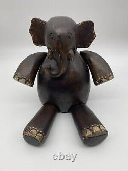Large Articulated Folk Art Style Hand Carved Elephant Sitting