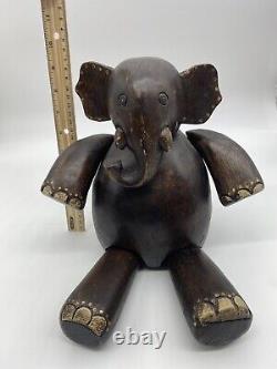 Large Articulated Folk Art Style Hand Carved Elephant Sitting