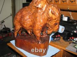 Magnificent Carved one piece Buffalo cedar wood finished
