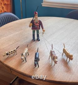 Original Primitive Folk Art Santa Walking / Herding 5 Dogs Ken Lessnau wood
