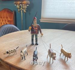 Original Primitive Folk Art Santa Walking / Herding 5 Dogs Ken Lessnau wood