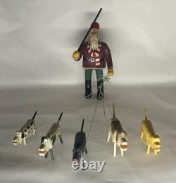 Original Primitive Folk Art Santa Walking / Herding 5 Dogs Ken Lessnau wood