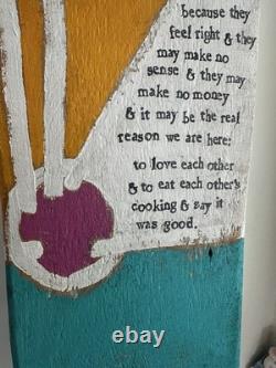 Painted wooden sculpture, known as a StoryPeople piece by the artist