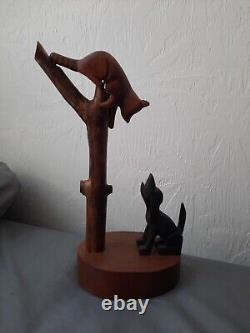 Rural American Folk Art. Hound Treeing Raccoon Wood Carving (Signed By Artist)