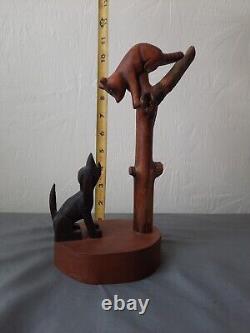 Rural American Folk Art. Hound Treeing Raccoon Wood Carving (Signed By Artist)