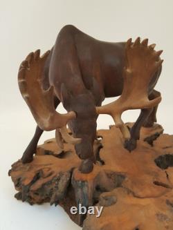 Vintage folk art hand carved wood moose sculpture on burl wood base signed KK 87