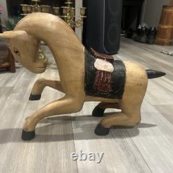 Vintage hand-carved and hand-painted wooden folk art horse figurine