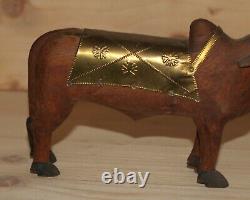 Vintage hand carved wood cattle figurine with brass ornaments